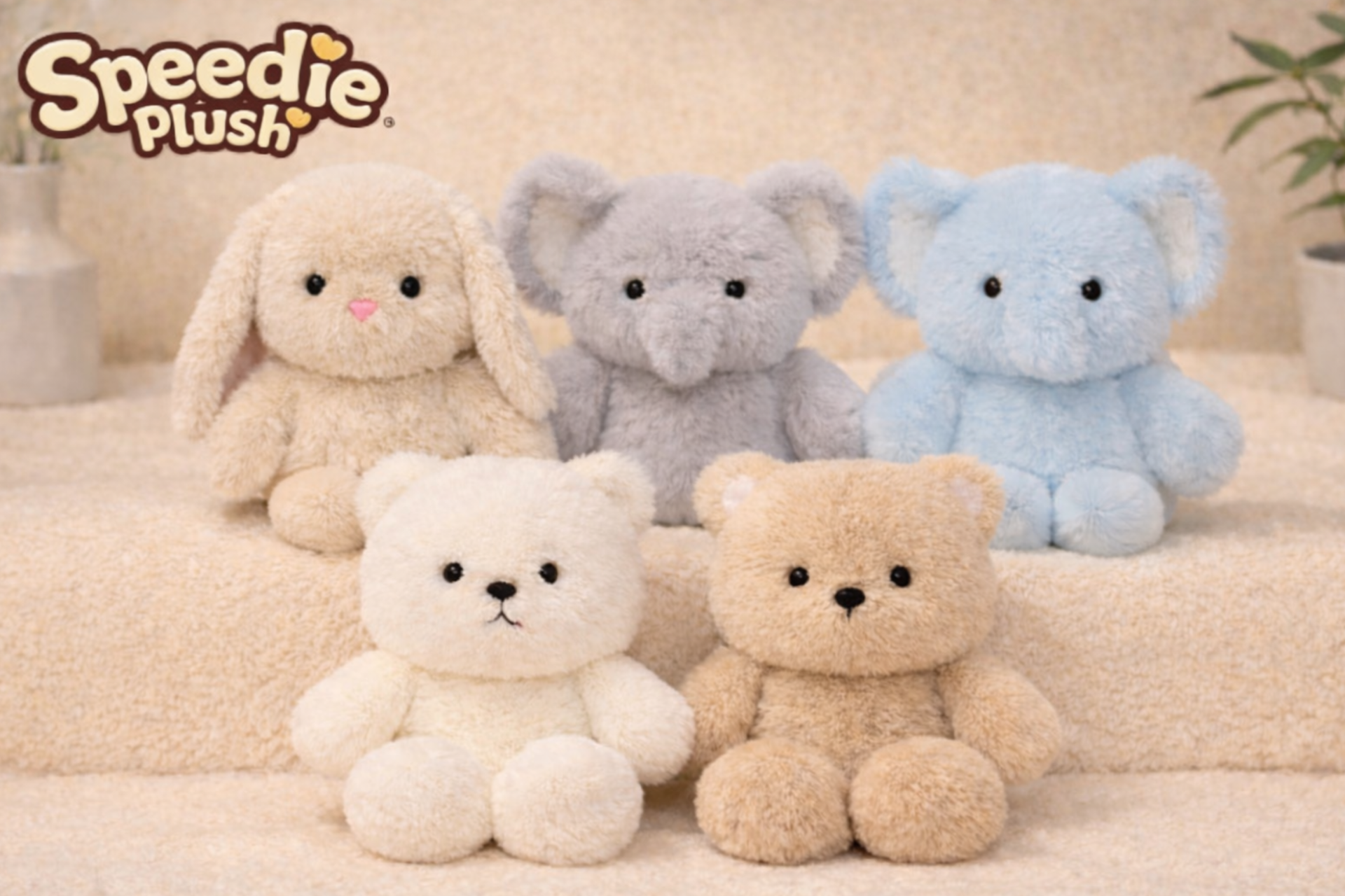 Collection of plush toys including a bunny, elephant, and bears on a soft surface with 'Speedie Plush' branding.